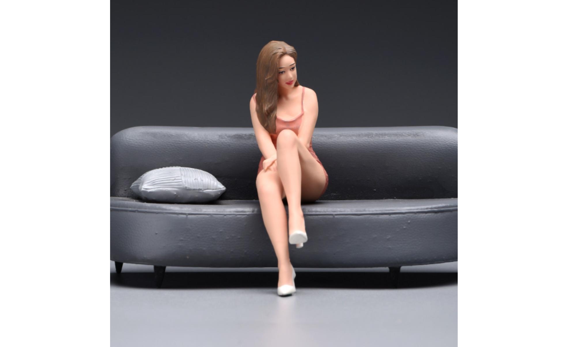 Seated Woman Figurine Rose-Hued Dress Miniature Figurine Cross-Legged